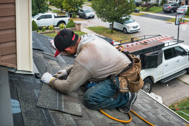 Professional Roofing technician working in Marion, MS